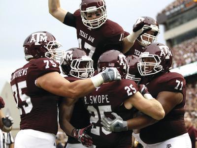 David J. Phillip/AP
The SEC has accepted an invitation for Texas A&M to become its 13th member.