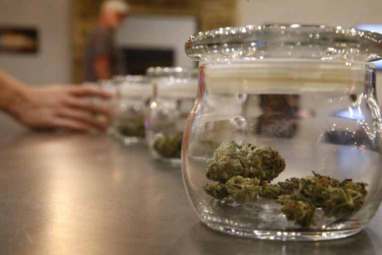Marijuana for sale is kept in jars for customers to sample smellsÂ at aÂ Colorado Harvest Company recreational marijuana store, in Aurora, Colo., Wednesday, Sept. 16, 2015. (AP Photo/Brennan Linsley)