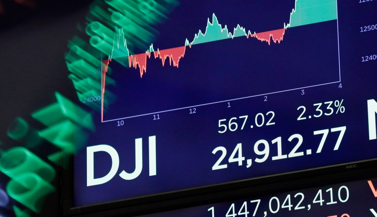 In his State of the Union address, President Trump was optimistic about the stock market. A week later, the Dow Jones fell in anticipation of higher interest rates due to an improving economy. (AP Photo/Richard Drew)