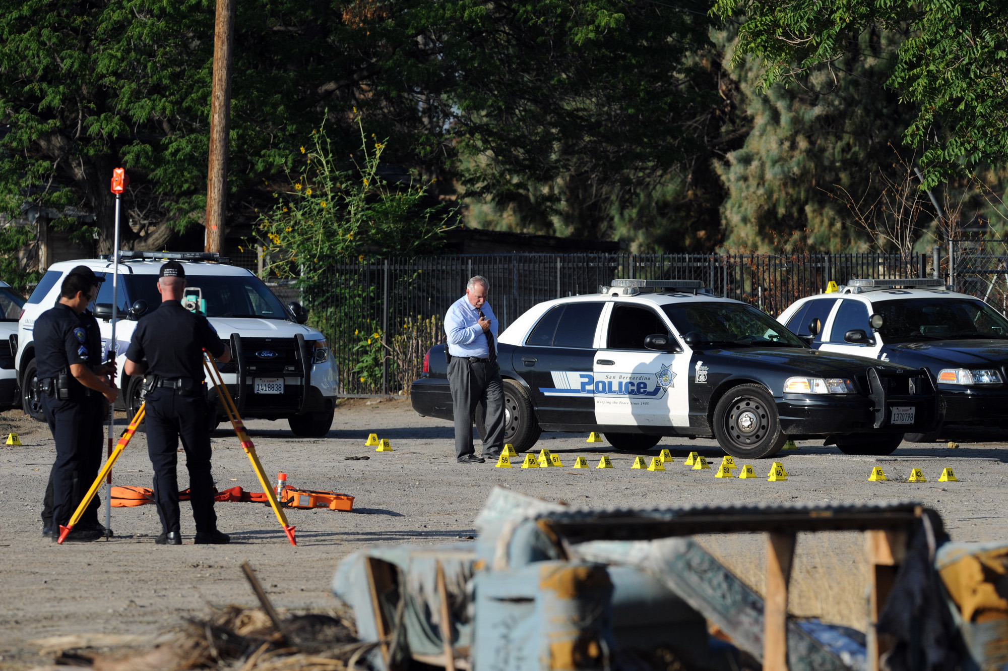 Wounded San Bernardino officer in induced coma