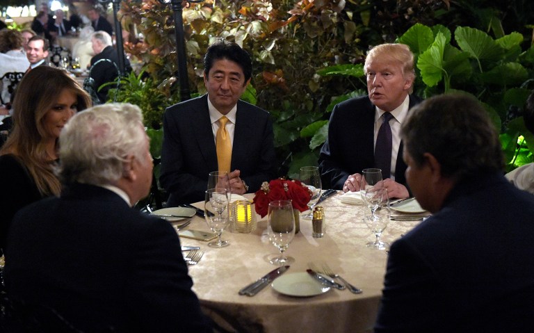 President Trump, second from right, and first lady Melania Trump, left, sit down to dinner with Japanese Prime Minister Shinzo Abe, center, at Mar-a-Lago in Palm Beach, Fla., in February. Fees at the club top $200,000. (AP Photo/Susan Walsh)