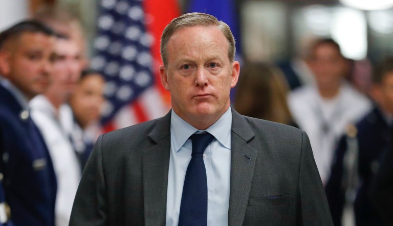 White House press secretary Sean Spicer walks down the hallway during President Donald Trump's visit to the Pentagon, Thursday, July 20, 2017.   White House Press Secretary Sean Spicer has resigned over hiring of new communications aide.  (AP Photo/Pablo Martinez Monsivais)