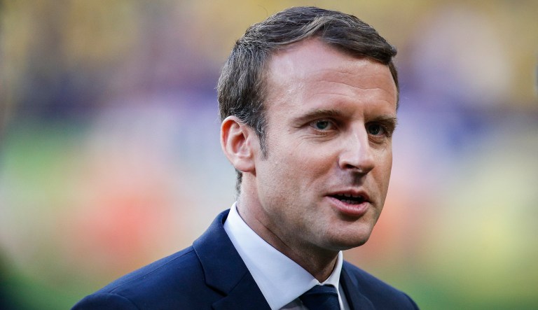 Macron's new initiative encourages American scientists unhappy with Trump's decision to come and work in France. (AP Photo/Kamil Zihnioglu)