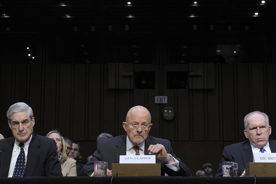 Director of National Intelligence James Clapper told the Senate Finance Committee Tuesday that Chinese espionage efforts against U.S. interests have markedly increased in recent years. FBI Director Robert Mueller is to Clapper's right, while CIA Director John Brennan is to the left. (AP Photo)