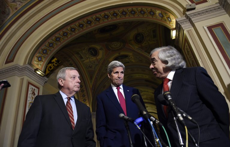 Energy Secretary Ernest Moniz, right, standing with Secretary of State John Kerry, center, and Sen. Richard Durbin, left, speaks to reporters following their meeting on Capitol Hill on the Iran nuclear deal. (AP Photo/Susan Walsh)