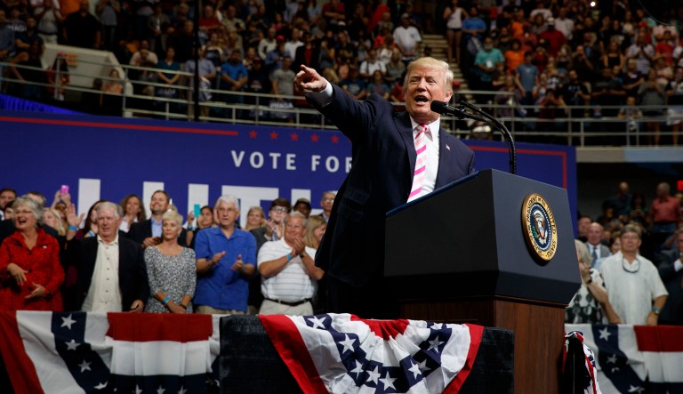 Trump knows what the flag, the anthem, and pride in America means to his supporters, even if it means nothing to certain commentators on MSNBC and CNN. (AP Photo/Evan Vucci)