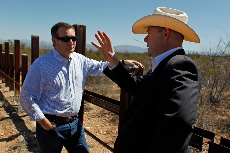 Arizona House Speaker David Gowan, right, speaks with Republican presidential candidate Sen. Ted Cruz, R-Texas, during a visit to the Arizona south border with Mexico in Douglas, Ariz., Friday, March 18, 2016. (AP Photo/Ricardo Arduengo)