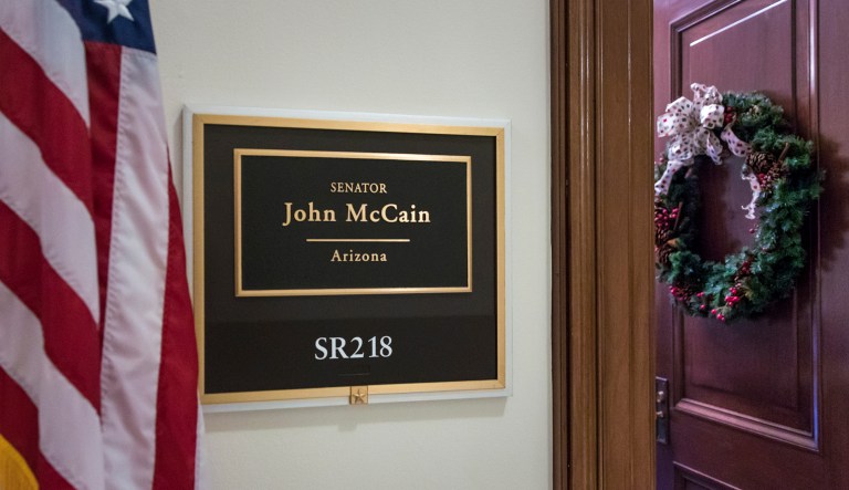 The entrance to the office of Sen. John McCain, R-Ariz., is seen on Capitol Hill, in Washington, Thursday, Dec. 14, 2017, as the senior lawmaker and chairman of the Armed Services Committee is away as he is treated for the side effects of brain cancer therapy. (AP Photo/J. Scott Applewhite)