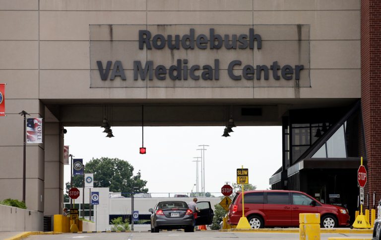Visitors leave the Richard L. Roudebush Veterans Administration Medical Center in Indianapolis on Monday. An audit of VA hospitals and clinics nationwide has found that nearly 275 Indiana patients are still waiting for initial appointments at facilities in Indianapolis and northern Indiana 90 days or more after requesting them. (AP Photo/Darron Cummings)