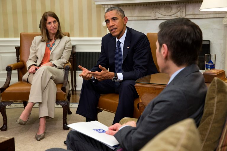 Sylvia Burwell, Secretary of Health and Human Services, left, and Dr. Thomas Frieden, Director of the Centers for Disease Control and Prevention, far right, listen as President Barack Obama speaks to the media about the government's Ebola response, in the Oval Office of the White House Thursday. (AP Photo/Jacquelyn Martin)