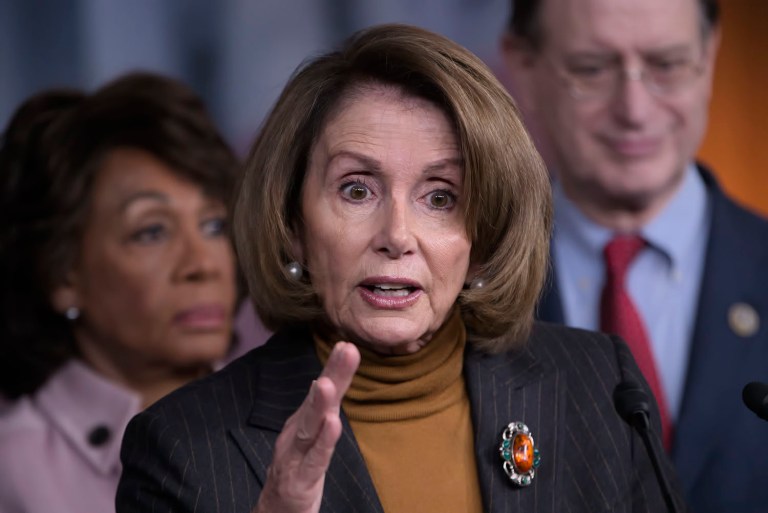 House Democrats, including House Minority Leader Nancy Pelosi, continue to highlight examples of people barred from entering the U.S., including a member of the Iraqi Parliament. (AP Photo/J. Scott Applewhite)