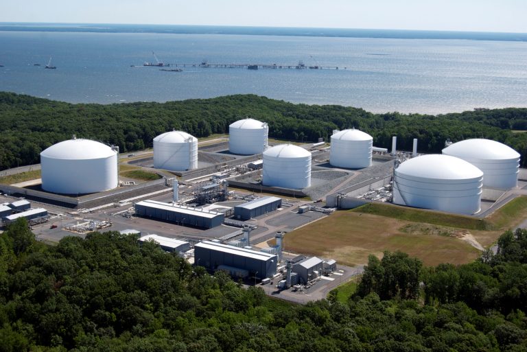 In this July 1, 2010, photo provided by Dominion Resources shows tanks at the Cove Point LNG terminal at Cove Point in Calvert County, Md. The debate over exporting liquefied natural gas is intensifying as the Energy Department considers an array of applications to ship the fuel to Japan, India and other countries where prices are far higher than in the United States. (AP Photo/Dominion Resources)