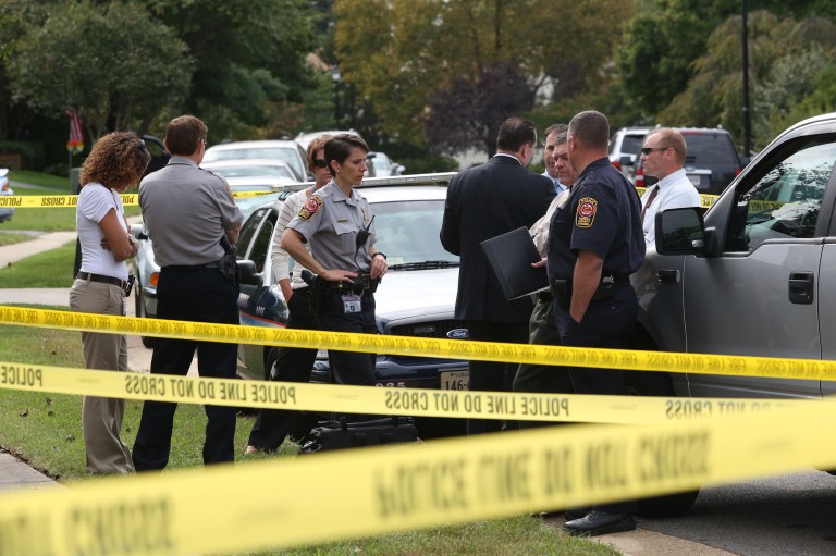 Fairfax County police at the scene of a family home where they say four people were found dead in Herndon on Sept. 25. (Graeme Jennings/Examiner)