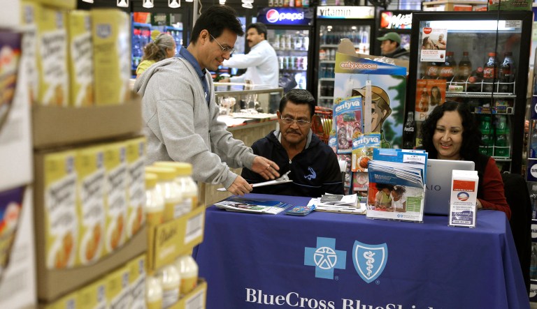 Blue Cross and Blue Shield of Kansas City is pulling out of 32 counties in Kansas and Missouri next year. (AP Photo/Gerry Broome)