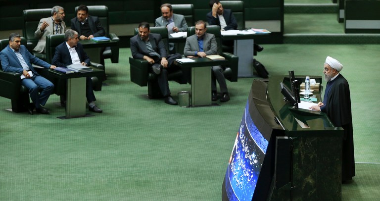 Iranian President Hassan Rouhani demanded that President Obama not sign an extension of U.S. sanctions, saying the bill is a violation of a landmark nuclear deal. (AP Photo/Vahid Salemi)