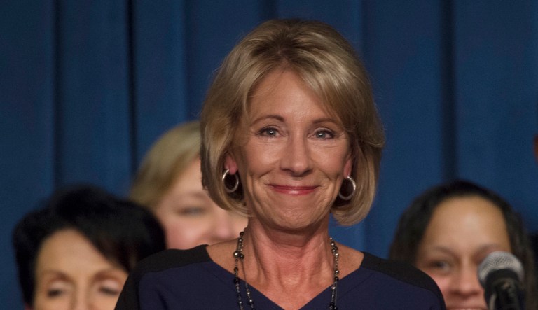 Many radical progressive activists seem to believe Republicans such as DeVos and Carson bear evil intentions and actually believe in the genetic superiority of the white race. (AP Photo/Molly Riley)