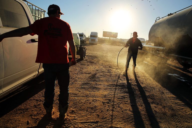 A truck used to carry sand for fracking is washed in a truck stop on February 4, 2015 in Odessa, Texas. The industry says the EPA's scope of what is considered fracking was too broad. (Getty Images)