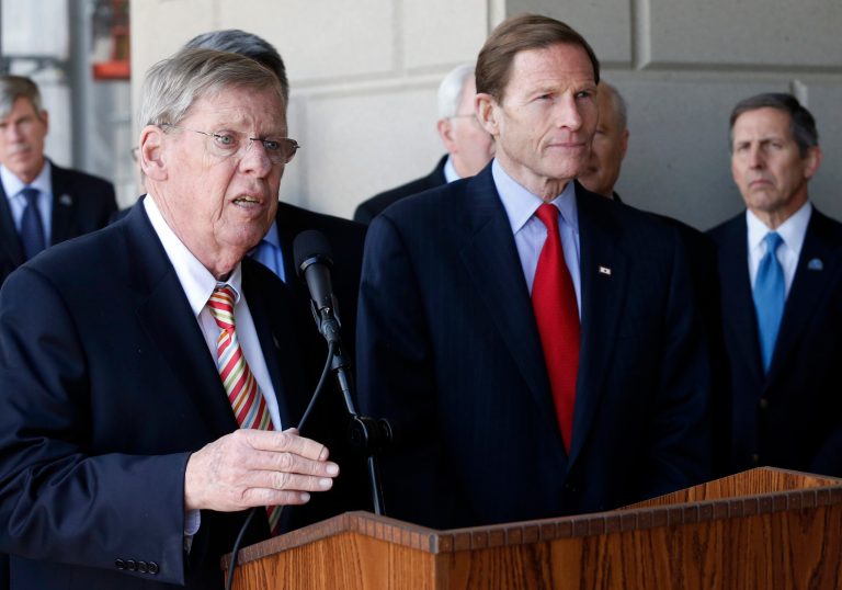 Sen. Johnny Isakson, R-Ga., left, speaks to members of the media on April 24, 2015, following a Senate delegation tour of the over-budget Veterans Administration hospital complex, which is under construction, in Aurora, Colo. (AP Photo)