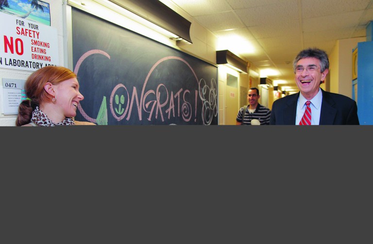 Dr. Robert Lefkowitz, right, of Duke University, arrives at his office at Duke to congratulations on Wednesday, Oct. 10, 2012, the day Lefkowitz heard he had won the 2012 Nobel Prize in chemistry. Lefkowitz and Brian Kobilka of Stanford University School of Medicine won the Nobel Prize in chemistry Wednesday for studies of protein receptors that let body cells sense and respond to outside signals like danger or the flavor of food. Such studies are key for developing better drugs. (AP Photo//Ted Richardson)