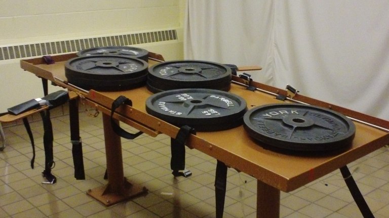   This undated photo provided by the Ohio Department of Rehabilitation and Corrections shows 540 pounds of weights placed on the execution table at the Southern Ohio Correctional Facility in Lucasville, Ohio to test the table's load bearing. Ohio death row inmate Ronald Post, scheduled for execution Jan. 16, 2013, is arguing that, at 450 pounds, can not be humanely executed under both the state's usual method and the untested backup procedure. (AP Photo/Ohio Dept. of Rehabilitation and Corrections)  