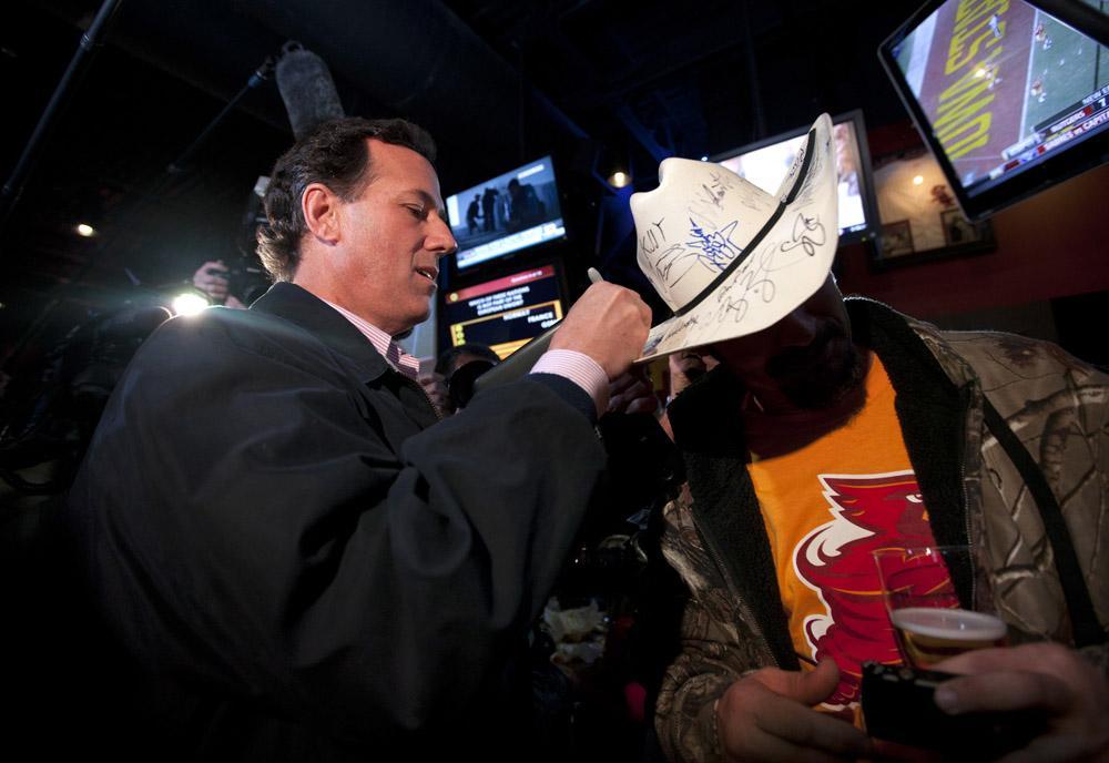 Santorum says he’s no Mike Huckabee
