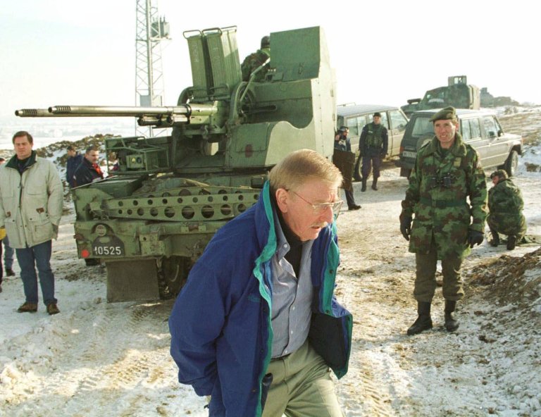 William Walker, the U.S. diplomat who heads the Organization for Security and Co-operation in Europe's team of international verifiers in Kosovo, observes Serb military positions near Podujevo, Dec. 25,1998. (AP File)