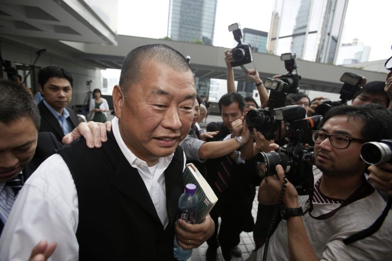 In this June 23, 2009, file photo, media magnate Jimmy Lai appears in court in Hong Kong after a Chinese man was convicted in Hong Kong for allegedly planning to shoot two prominent pro-democracy figures, Lai and veteran politician Martin Lee.