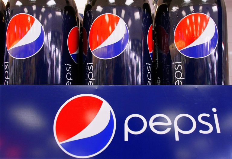 FILE - This Feb. 9, 2011 file photo shows bottles of Pepsi at a grocery store in Springfield, Ill. PepsiCo reports quarterly financial results Wednesday, July 23, 2014. (AP Photo/Seth Perlman, File)