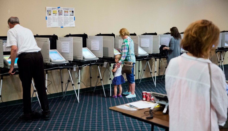 Last year, the Obama administration filed an amicus brief in favor of civil rights groups who were challenging the way Ohio purges its voter rolls. (AP Photo/David Goldman)