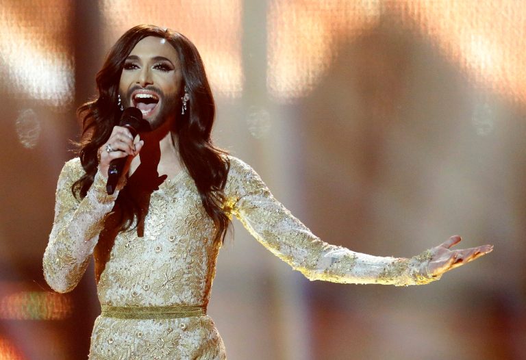 Singer Conchita Wurst representing Austria performs the song 'Rise Like a Phoenix' during the final of the Eurovision Song Contest  in the B&W Halls in Copenhagen, Denmark, Saturday, May 10, 2014. Wurst won the competition. (AP Photo/Frank Augstein)