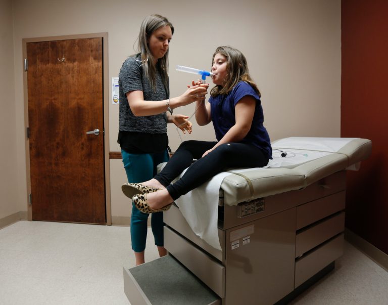 Instead of price shopping, consumers in the study stopped getting all sorts of medical procedures, even those that are useful. (AP Photo/Mike Groll)