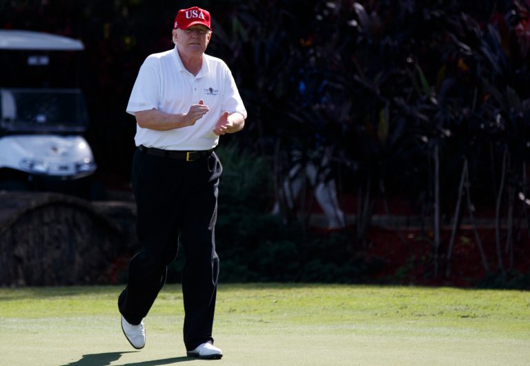 President Donald Trump arrives to meet with members of the U.S. Coast Guard, who he invited to play golf, at Trump International Golf Club, Friday, Dec. 29, 2017, in West Palm Beach, Fla. (AP Photo/Evan Vucci)