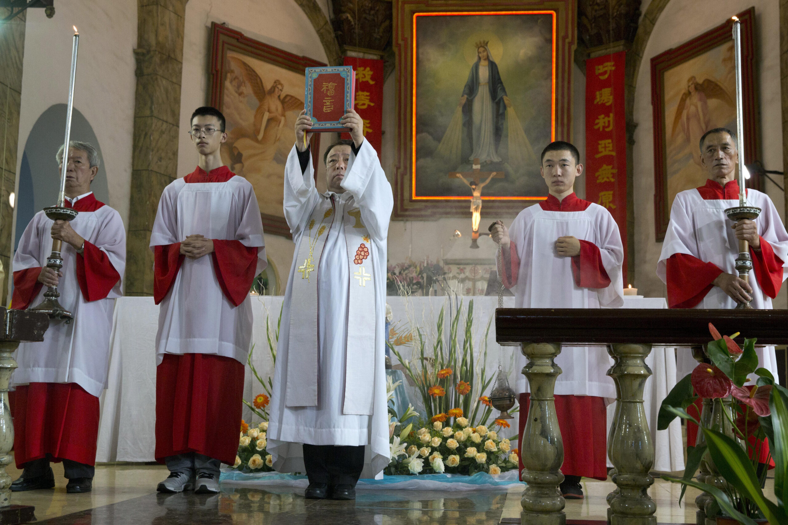 Who stopped China Catholics going to South Korea?