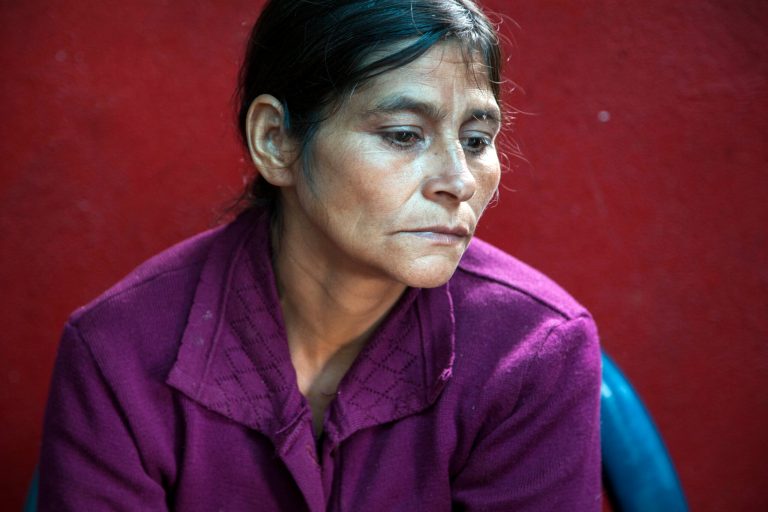 Cipriana Juarez Diaz, mother of Gilberto Francisco Ramos Juarez, a Guatemalan boy whose decomposed body was found in the Rio Grande Valley of South Texas, listens to her husband talk, during an interview at their home in San Jose Las Flores, in the northern Cuchumatanes mountains of Guatemala, Tuesday, July 1, 2014. Juarez Diaz said that she begged her son not set out on the dangerous journey from their modest cinder block- and sheet-metal home high in the northern Guatemalan mountains. (AP Photo/Luis Soto)