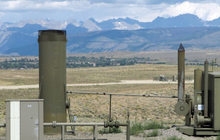 A smokestack at a gas production facility in western Wyoming.Â The smog rules would cut the current ozone standard of 75 parts per billion to as low as 65.Â (AP Photo/Mead Gruver)