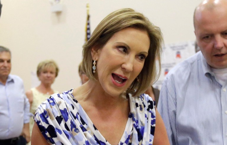 Republican presidential candidate Carly Fiorina greets potential voters, Monday, July 6, 2015, at a campaign town hall event in Barrington, N.H. (AP Photo/Elise Amendola)