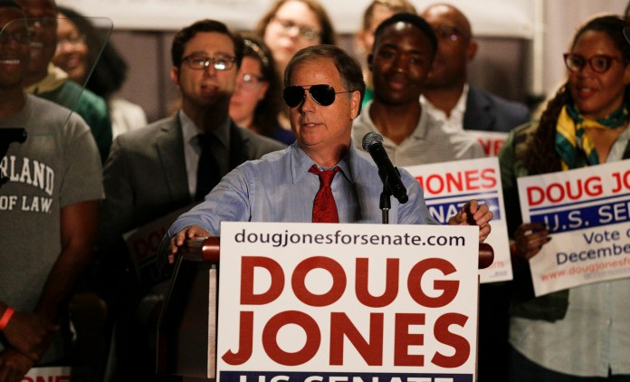 The opinion piece offered three suggestions for voters, who go to the polls on Dec. 12: Stay home, vote for a write-in candidate, or, their preferred option, vote for Jones, who was described as "a moderate Democrat and a strong candidate for all Alabamians." (AP Photo/Brynn Anderson)