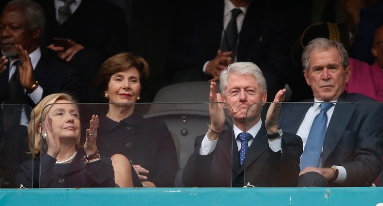 The Clintons and Bushes will attend Donald Trump's inauguration after all, despite their bad blood with the president-elect. (AP Photo/Matt Dunham)