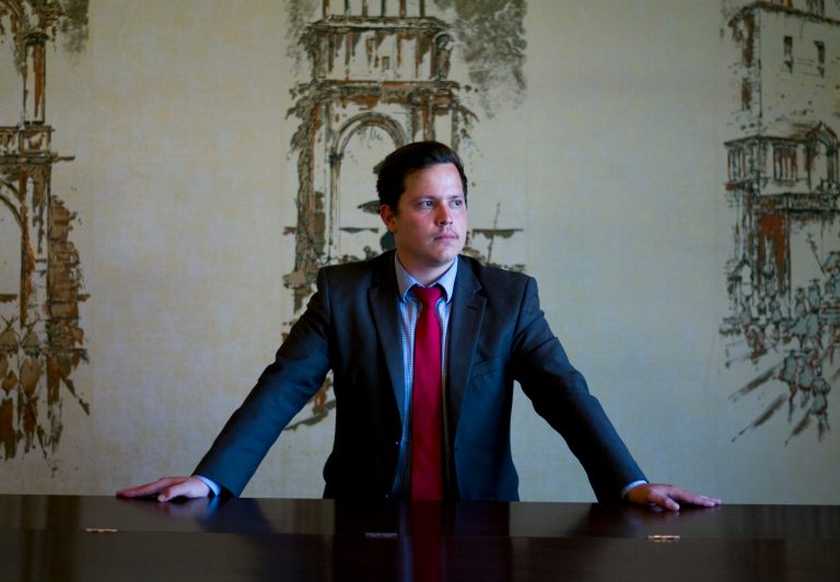 Julian Zatarain poses for a photo at Huntington Park City Hall, Tuesday, in Huntington Park, Calif. Zatarain, 21, who is in the country illegally, was sworn in Monday to a position with the parks and recreation commission in the city. (AP Photo/Jae C. Hong)