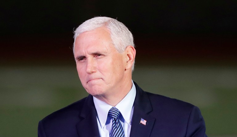 Vice President Mike Pence had planned to leave Tuesday for the Middle East, but announced Monday that he will stay in the States until the Senate passes a final tax bill. (AP Photo/David J. Phillip)
