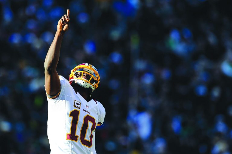 Patrick McDermott/Getty Images
Robert Griffin III returned Sunday after missing last week's game because of a sprained right knee.