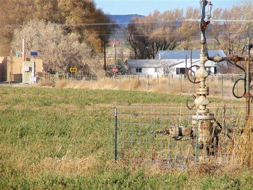 In this 2007 file photo, natural gas wellheads and other production facilities are shown around the rural community of Pavillion, Wyo. The ranking Republican on the Senate Environment and Public Works Committee is asking the head of the U.S. Environmental Protection Agency for more information about an EPA investigation into groundwater contamination in a Wyoming gas field. 