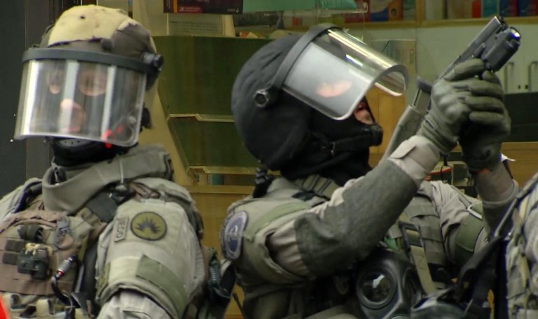 After an intense four-month manhunt across Europe and beyond, police on Friday captured Salah Abdeslam, the top fugitive in the Paris attacks in the same Brussels neighborhood where he grew up. (VTM via AP)