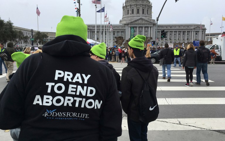 The underlying principle here is that abortion is an issue in which the moral facutlties, and perhaps religious faith, are intensely engaged, and that no citizen should be forced to fund someone else's decision to kill her gestating baby. (AP Photo/Jocelyn Gecker)