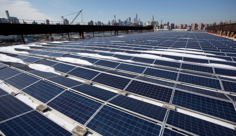 Renewable energy companies seek to convey an image of not just cleaner energy, but also cleaner politics. (AP Photo/Mark Lennihan)