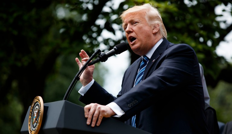 President Trump on Friday threatened to cancel press briefings and release all information from the White House in written releases. (AP Photo/Evan Vucci)