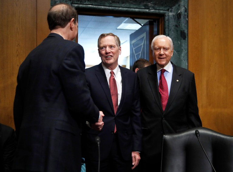 Senator Hatch (right) says Democrats are using Lighthizer's (center) nomination as leverage to pressure Trump administration on trade policy. (AP Photo/Manuel Balce Ceneta)