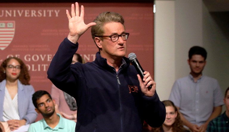 The president appeared to be suggesting that the MSNBC host and former Florida congressman should be investigated for potential involvement in Lori Klausutis' death in 2001. (AP Photo/Steven Senne)