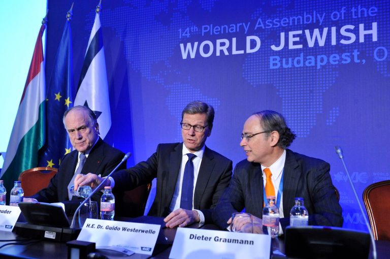 From left to right, President of the World Jewish Congress Ronald S. Lauder, German Foreign Minister Guido Westerwelle and President of the Central Council of Jews in Germany Dieter Graumann attend the 14th Plenary Assembly of the World Jewish Congress in Budapest, Hungary, Monday, May 06, 2013. (AP Photo/MTI, Lajos Soos)