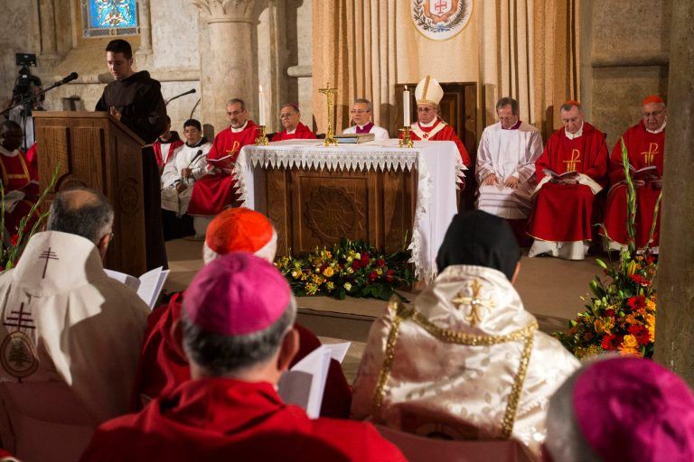 Pope Francis, center, attends a mass at the site known as the Cenacle, or Upper Room, where Christians believe Jesus had his last supper, in Jerusalem on Monday, May 26, 2014. Francis honored Jews killed in the Holocaust and other attacks and kissed the hands of Holocaust survivors as he capped his three-day Mideast trip with poignant stops Monday at some of the holiest and most haunting sites for Jews. (AP Photo/Jack Guez, Pool)
